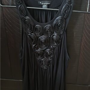 Black Sleeveless Top with Rosette Design